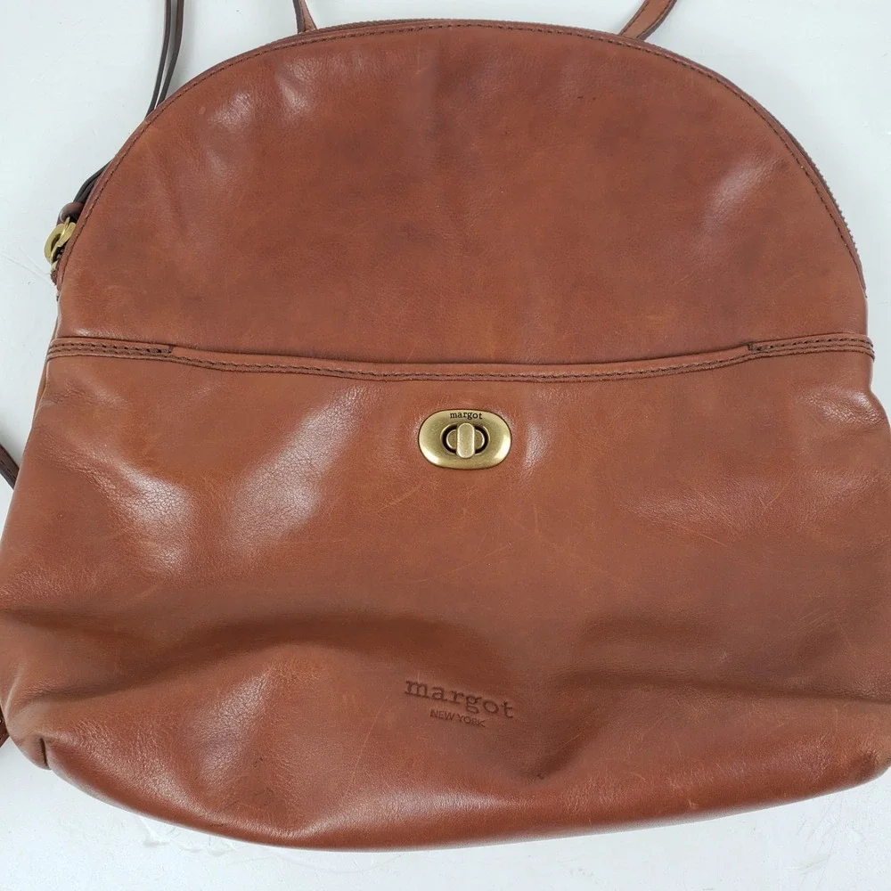 Margot New York Camille Turnlock Leather Backpack Brown Cognac Dome Bag